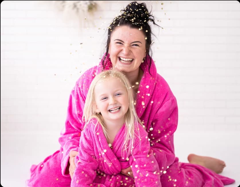 A parent and child sharing a One & Me spa visit at Hily's Sparkly Spa