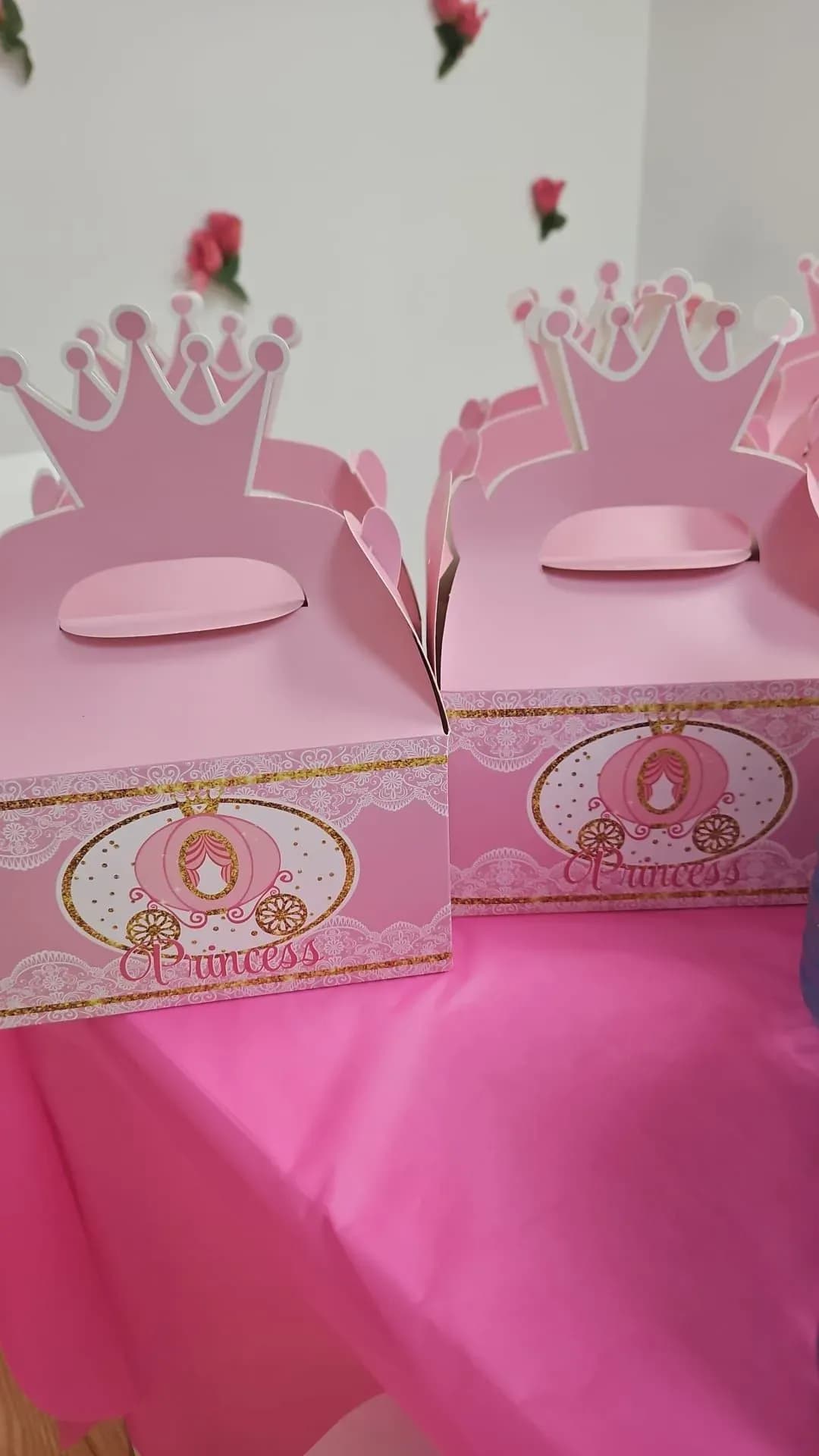 Pink princess favour boxes at a Little Sparkly Princess party