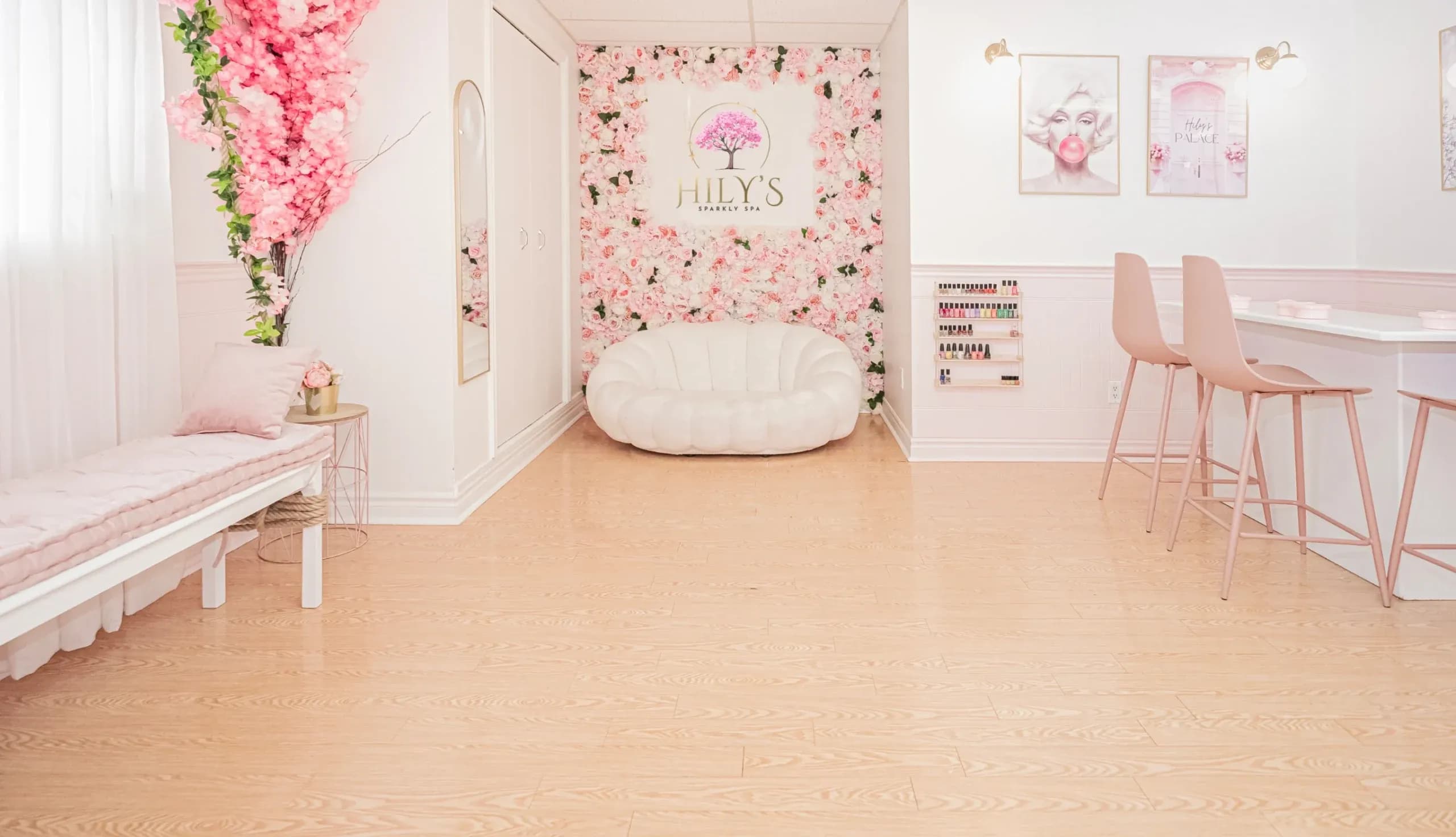 Inside Hily's Sparkly Spa — the blossom wall and pink manicure bar