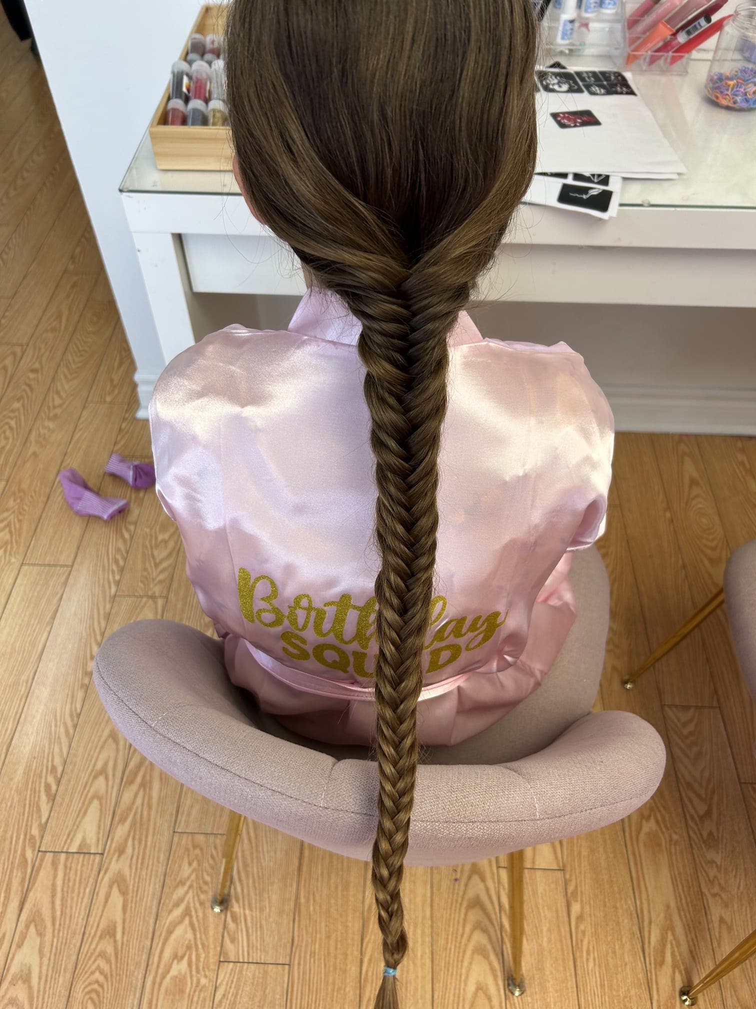 A fishtail braid styled for a Hily's spa guest